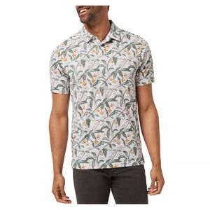 Travis Mathew White Floral Print Polo with Green Leaves and Orange Accents